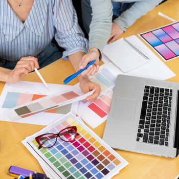 Ladies working on some papers - Contractors & IR35